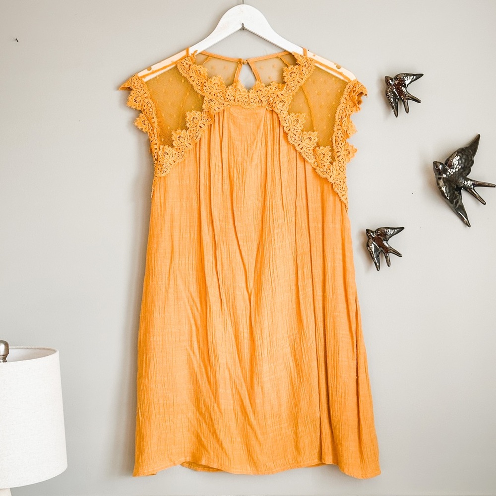 Francesca’s yellow mini dress